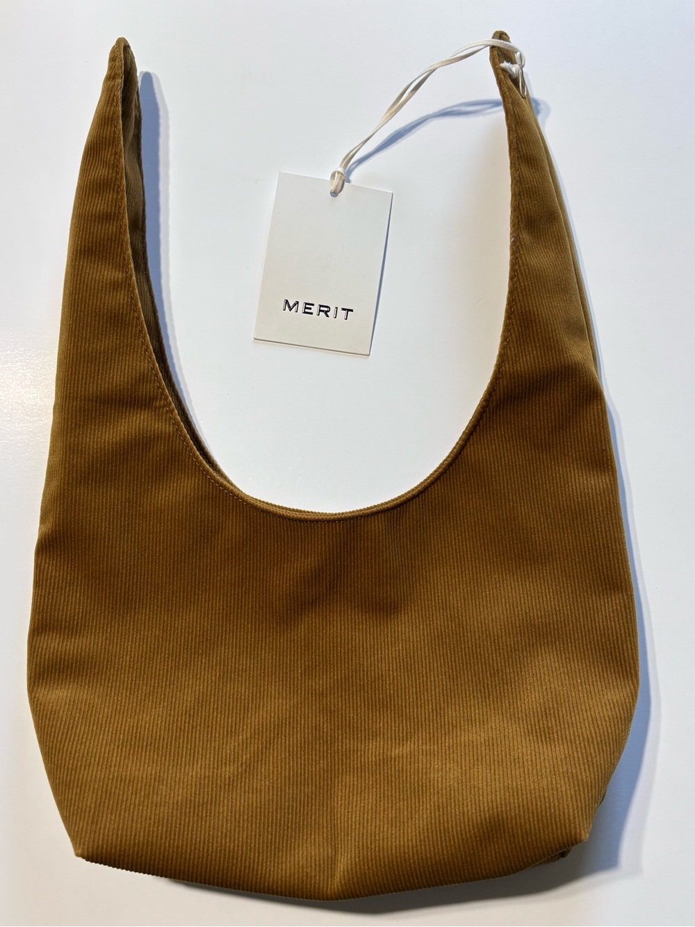 Merit Beauty Signature Bag Corduroy
Caramel Brown Knot Tie Makeup Pouch - Picture 2 of 3